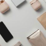Lucid_Origin_Minimalist_flatlay_of_modern_consumer_goods_inclu_0